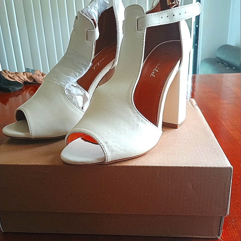 Beautiful white heels and long brown boots each only worn once for sale only $20
